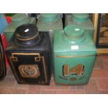 A set of five antique metal storage tins with lids
