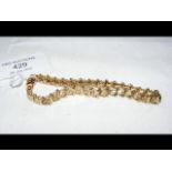 A lady's 14ct gold bracelet - 10.4g