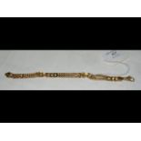 A 9ct gold bracelet - 13.8g