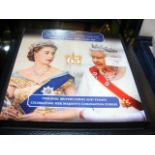 An Elizabeth II Coronation Jubilee Coin and Stamp