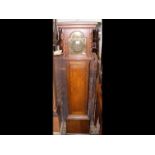 An oak cased Grandmother clock