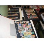 Collection of world stamps in three albums, includ