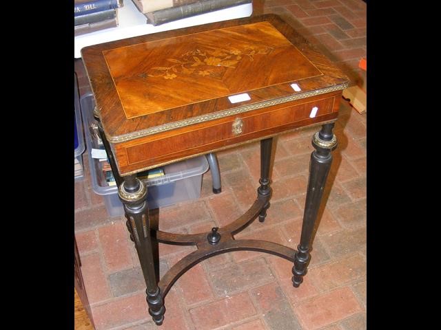 A small French worktable with marquetry top