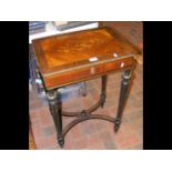 A small French worktable with marquetry top