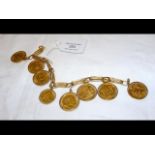 A 750 marked lady's bracelet with six full soverei