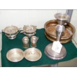 A silver candlestick, table salts, etc.