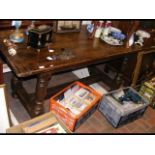 A period oak refectory table on turned supports -