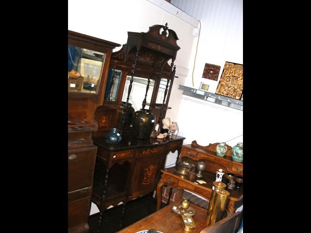 An inlaid Edwardian mirrored back sideboard