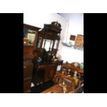 An inlaid Edwardian mirrored back sideboard