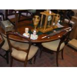 A 19th century mahogany oval dining table with cro