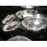 A pair of silver bonbon dishes - 12cm, together wi