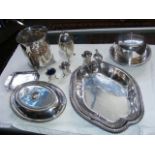 A silver three piece condiment set, together with