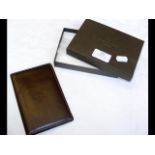 A Patek Philippe leather wallet and notepad with p