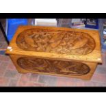 A small proportioned carved oak blanket chest