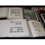 Four albums containing Commonwealth stamps - mint