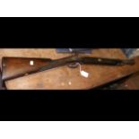 An antique blunderbuss, the engraved side plate ma