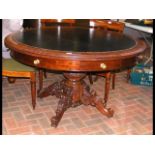 Antique drum table with selection of drawers and d