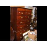 Antique mahogany chest on chest of small proportio