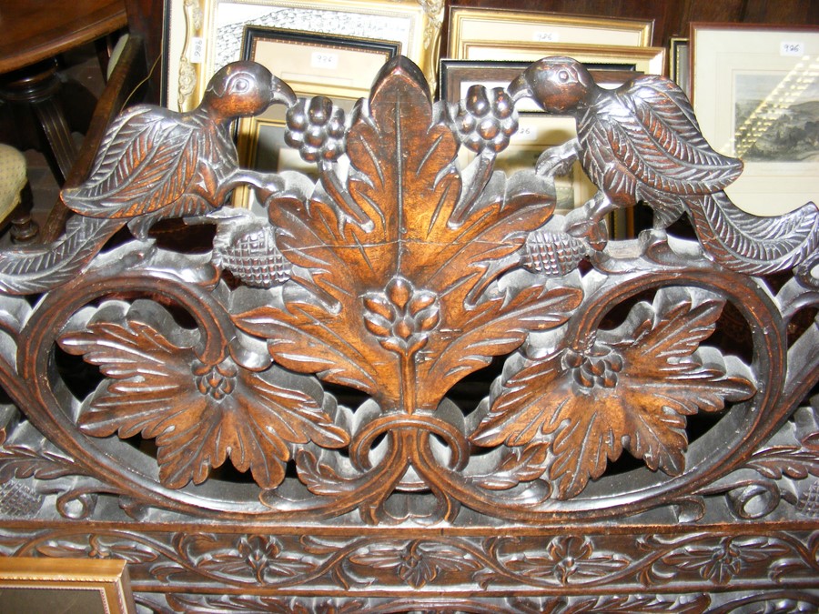 An antique heavily carved settle with hinged lift- - Image 8 of 10