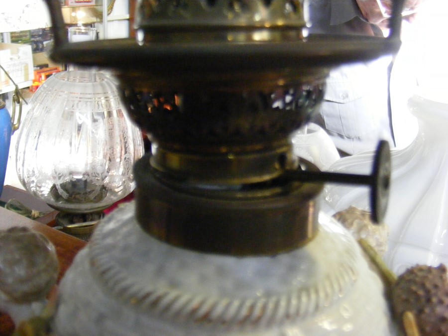 Three oil lamps with reservoirs in the form of bas - Image 3 of 14