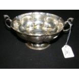 A continental white metal two handled bowl with ar
