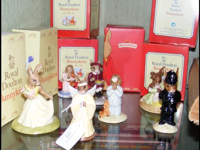 Seven collectable Bunnykins figures, including Wit