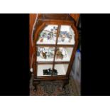 A small Queen Anne style walnut display cabinet on