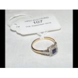 An 18ct gold sapphire and diamond ring - size P