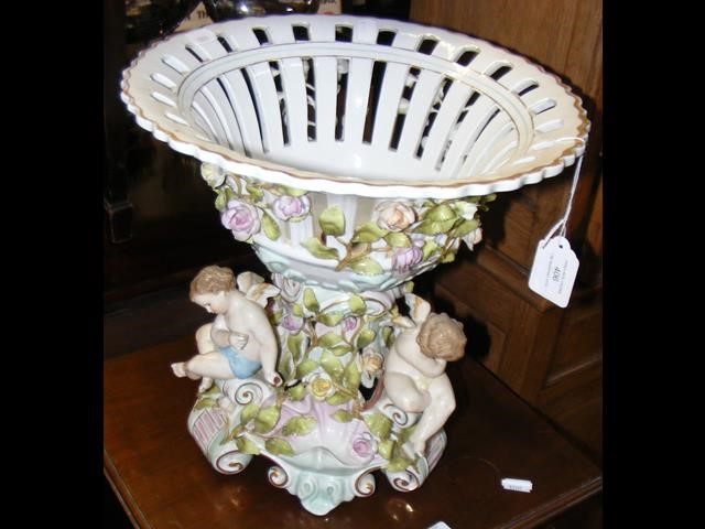 A Sitzendorf porcelain table centre with pierced b