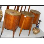 Three retro wooden and metal hotel lounge waste bins