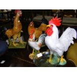 Four assorted ceramic chicken and cockerel ornamen