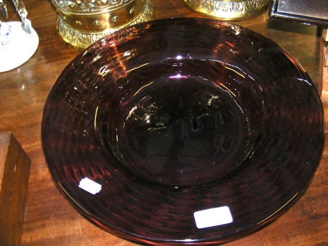 An amethyst glass bowl