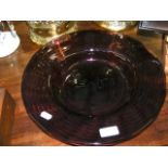 An amethyst glass bowl
