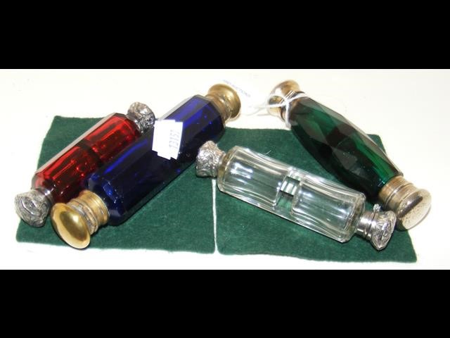 A collection of four double ended glass scent bott