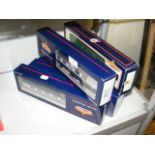 Seven boxed Bachmann carriages