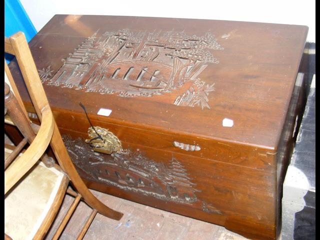 A carved oriental camphor wood chest - W