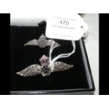 Two silver RAF brooches