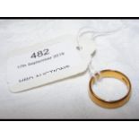 A 22ct gold wedding band - 5.9 grams