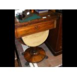 A 19th century rosewood work table