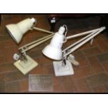 Two angle poise desk lamps designed by Herbert Ter