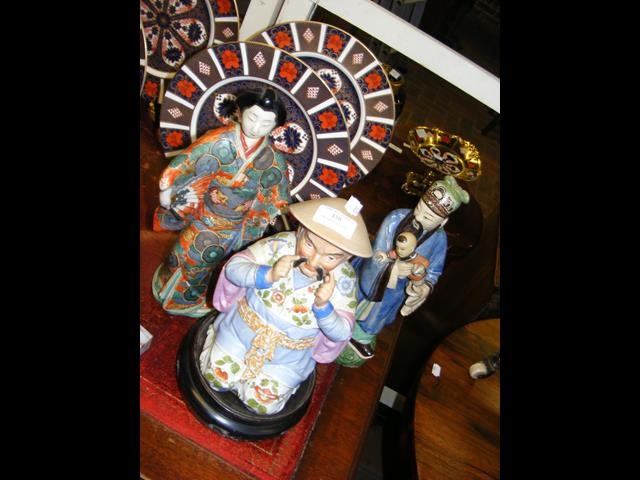 Three oriental ceramic figures, the largest H32cm