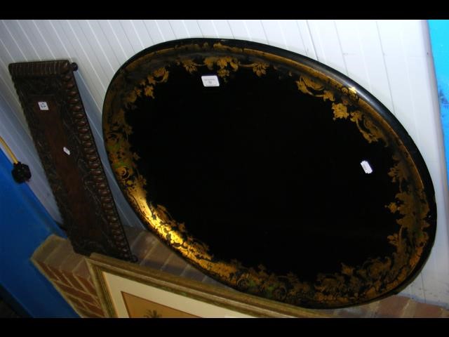 A large papier mache oval tray, together with a ca