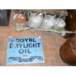 Four galvanised watering cans, together with an ol