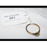 A diamond solitaire ring in 18ct gold setting