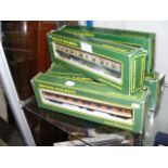 Six boxed replica railway carriages