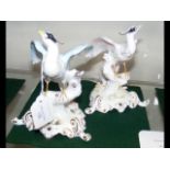 A pair of Royal Crown Derby bird ornaments with si
