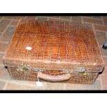 An antique crocodile skin suitcase - 34cm x 44cm