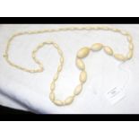 An antique ivory bead work necklace - 118 grams