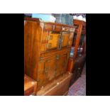 An oriental metal bound storage chest with shaped