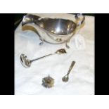 A silver sifter spoon, Skipton football medal, etc